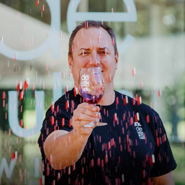 Hunter Valley winemaker Mike De Iuliis has fun with a glass of red wine