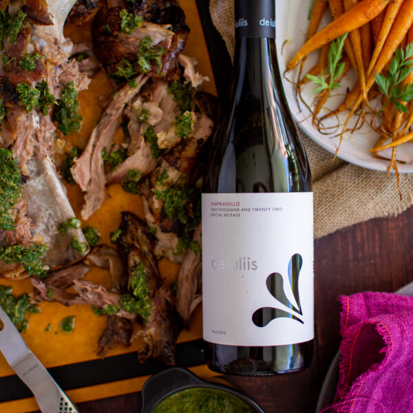 A bottle of De Iuliis Hunter Valley Tempranillo with slow cooked lamb shoulder