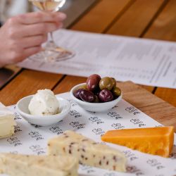 A cheese and olive platter enjoyed with a premium Hunter Valley wine tasting