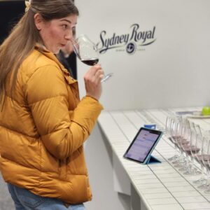 Winemaker Emily Glover, young female winemaker judging wines at the Sydney Royal Wine Show