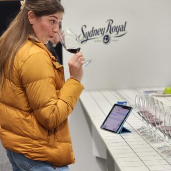 Winemaker Emily Glover, young female winemaker judging wines at the Sydney Royal Wine Show