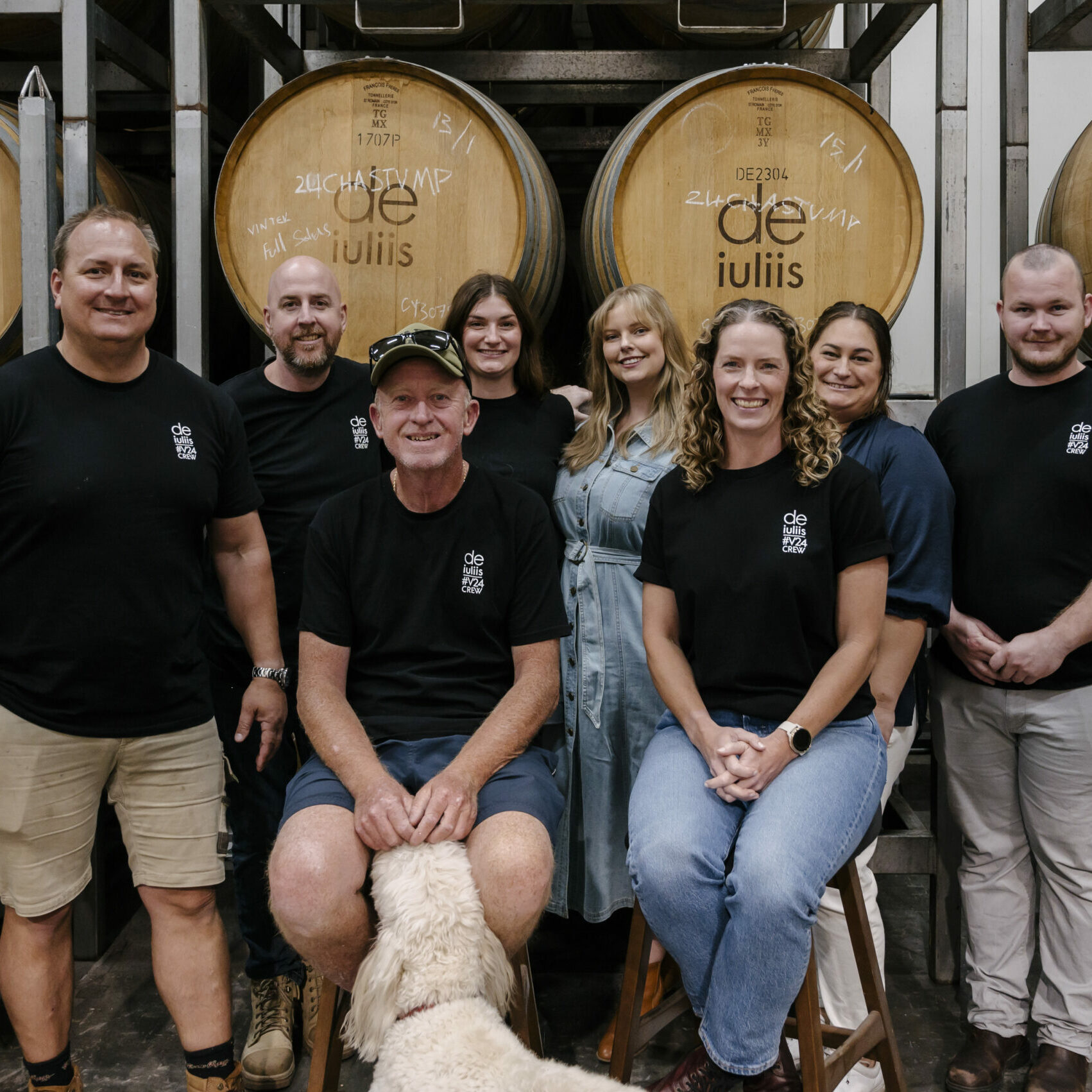 The De Iuliis Wine team altogether in the barrel room