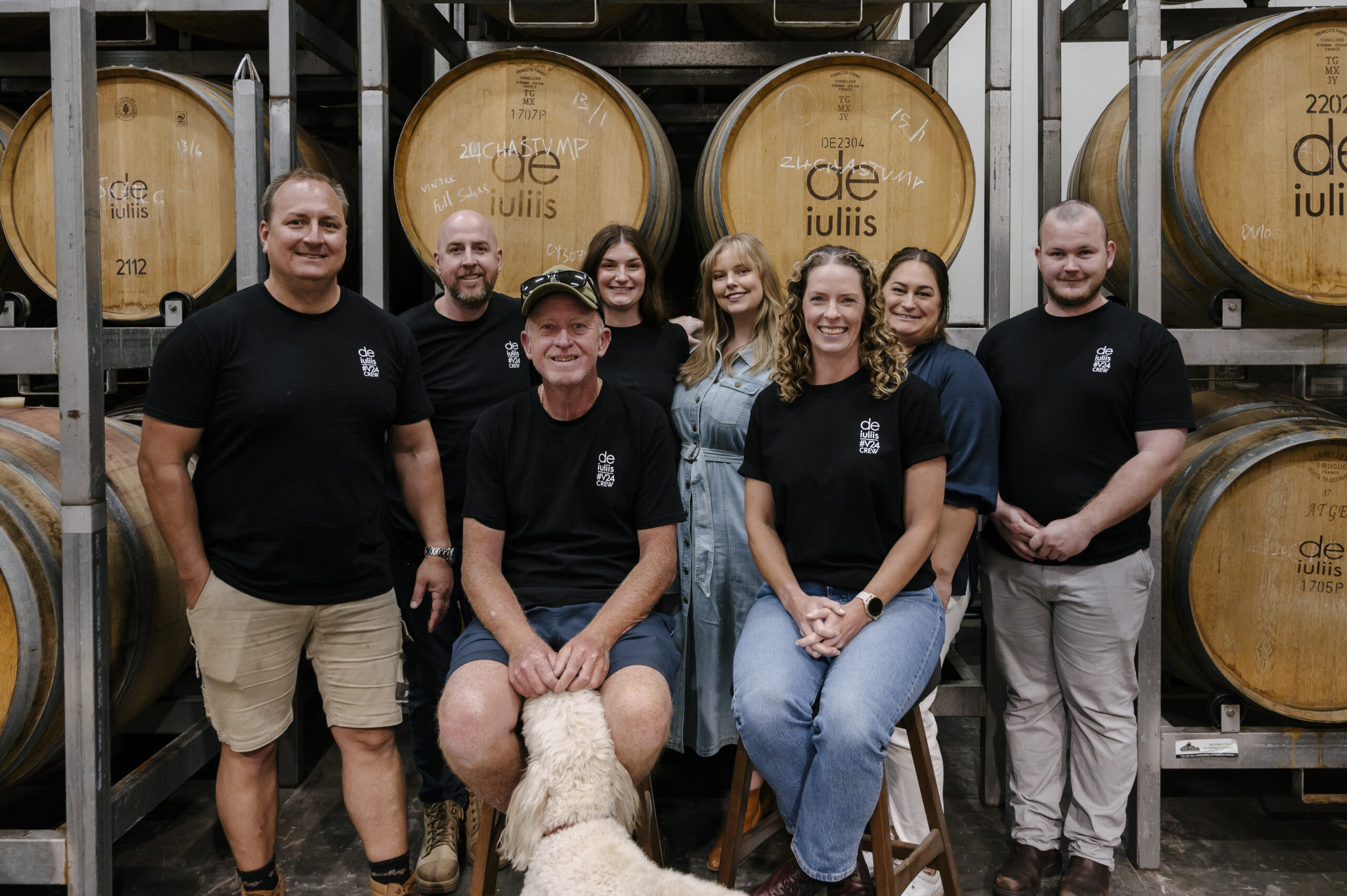 The De Iuliis Wine team altogether in the barrel room